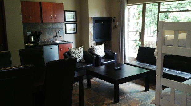 Super king studio lounge and dining area  - Treelands Abbey Dullstroom